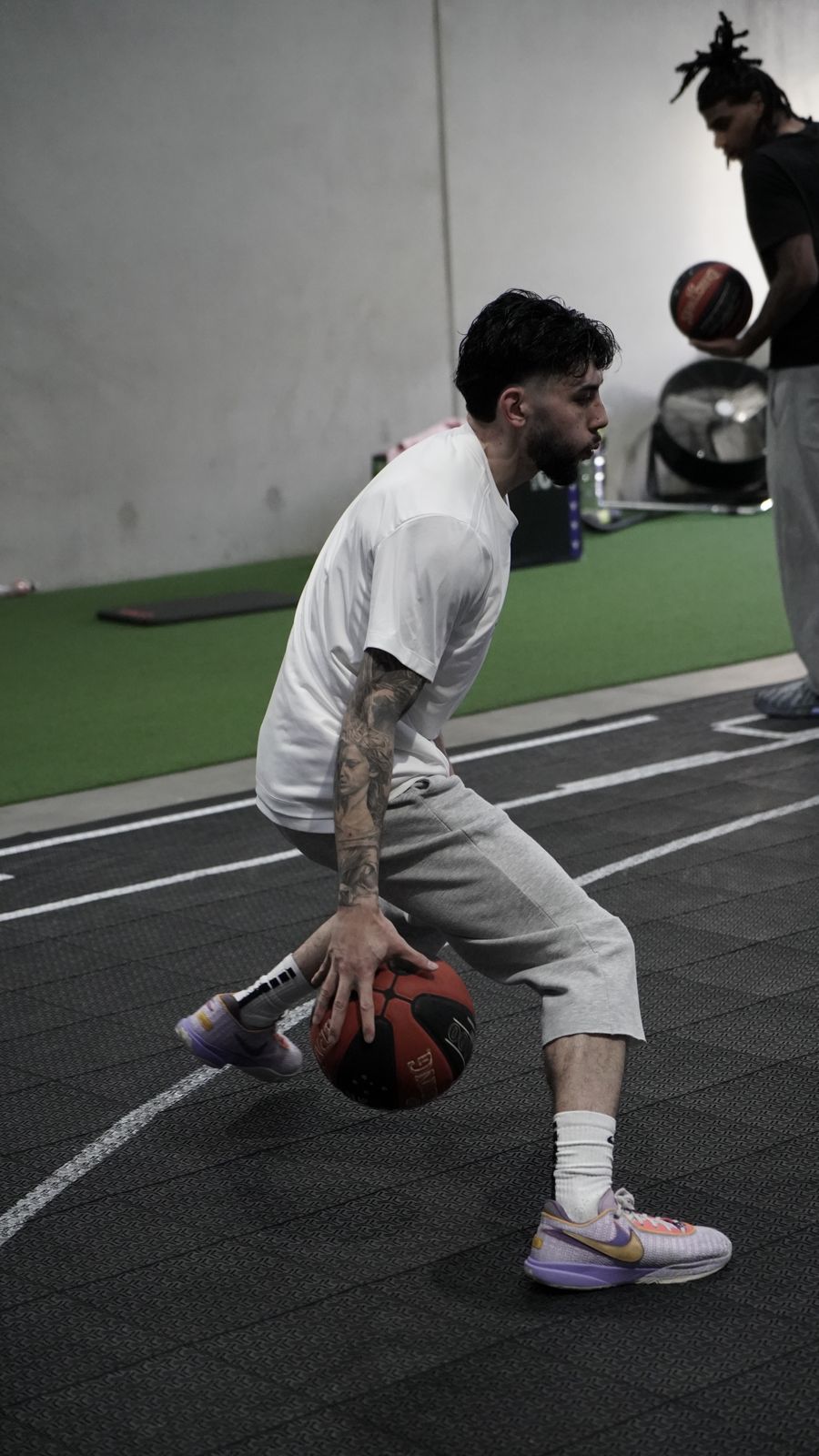 Player dropping low into a crossover on the From Zero court