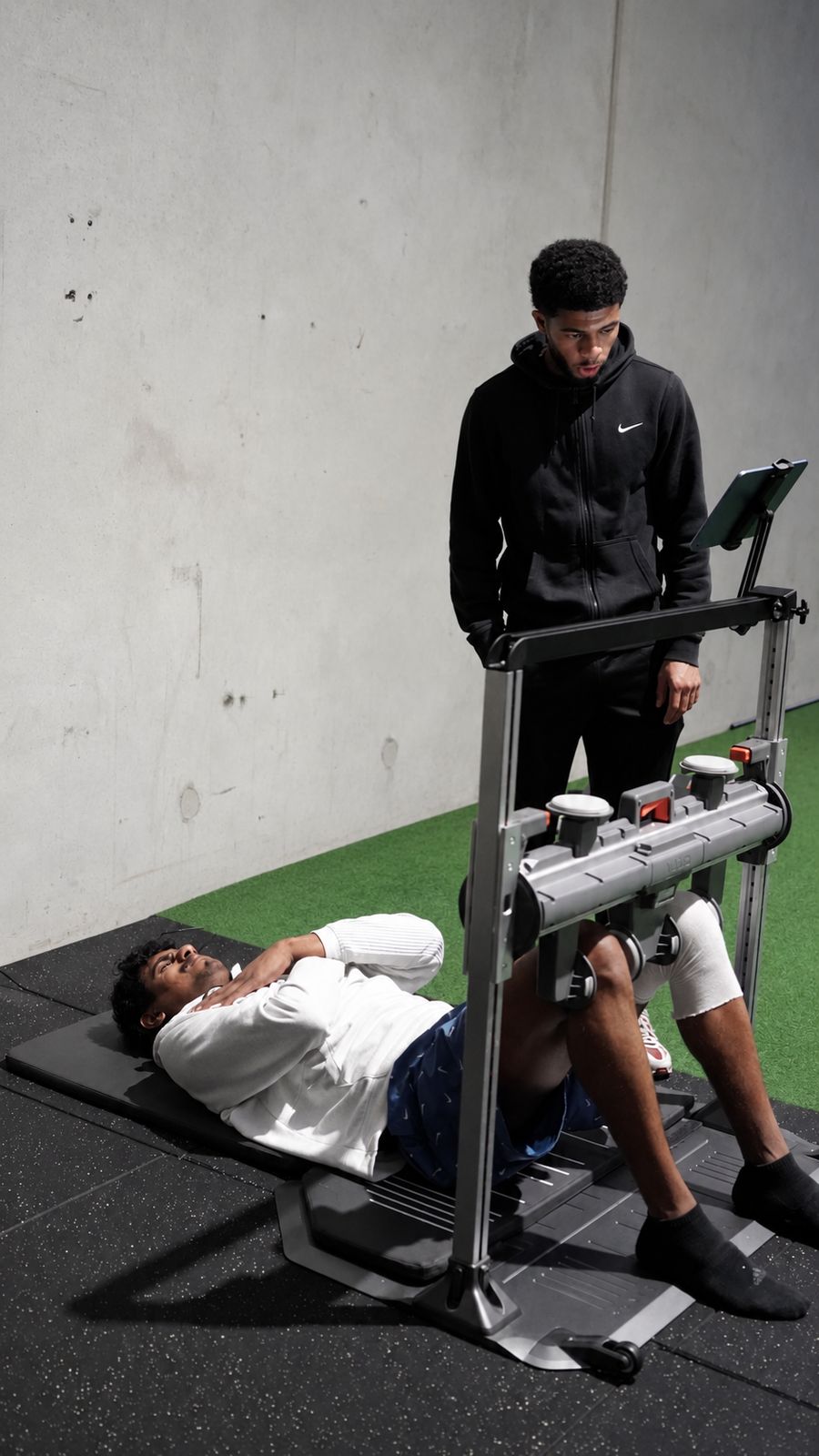Physio running a hamstring test